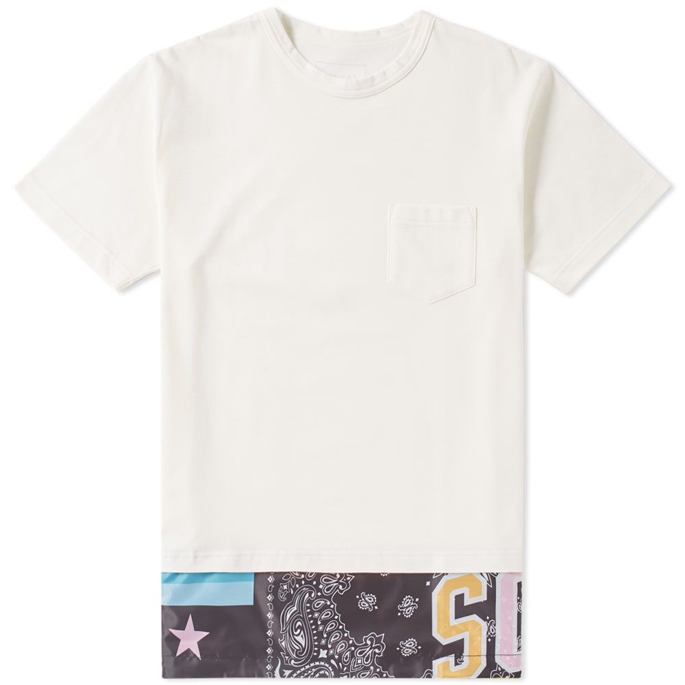 Characterful with their star and camouflage-covered pieces, SOPHNET.’s layered t-shirt is bursting with statement making patterns and colours. Cut with a cotton body and taffeta panelled hem, the drawcord adds a personalised fit to the overall loose silhouette.     

100% Cotton
Taffeta Patterned Hem
Drawcord Hem
Crewneck