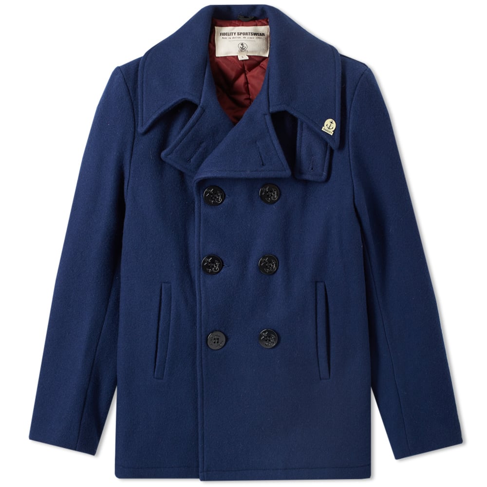 Fidelity have been manufacturing the finest outerwear since 1941, crafting their pieces in their hometown of Boston. The USN Wool Pea Coat - named for the fact it was originally created for use by the US Navy - features a warm wool-blend construction, with the classic double-breasted cut that is a defining feature of the pea coat. The coat is finished with a quilted lining, engraved anchor buttons, signature Fidelity pin to the collar and handwarmer pockets to either side.

80% Wool 20% Nylon
Engraved Buttons
Internal Pocket
Handwarmer Pockets To Front
Enamel Fidelity Pin
Vent To Back
Made In The USA