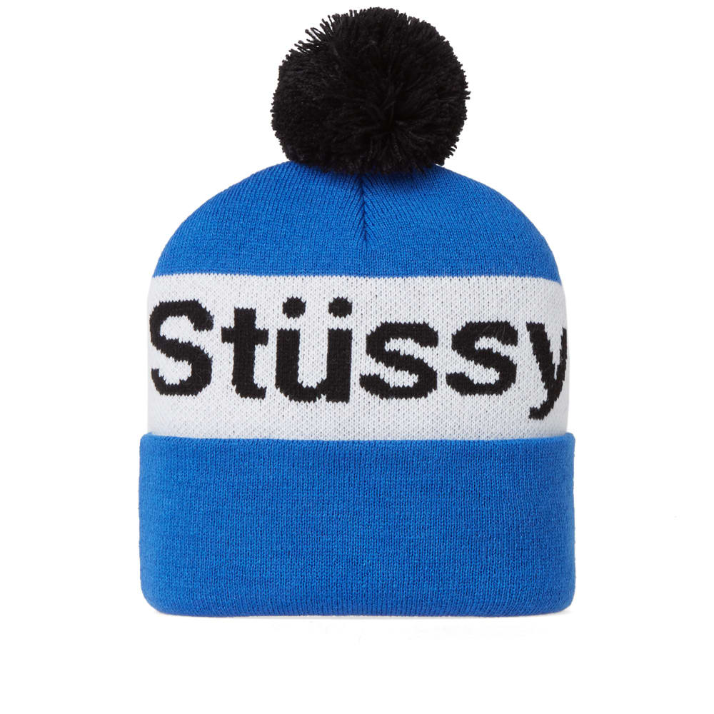 Originally sold around Laguna Beach, California from founder Shawn Stussy’s car, the surf-infused brand has evolved into a true streetwear behemoth. The Stüssy Helvetica Pom Beanie takes on an abundance of retro styling with contrasting branded band spanning the middle of this cosy headwear option and finished off with a large contrasting pomp om to the top.

100% Acrylic
Ribbed Construction
Bold Branding Throughout
Large Pom Pom