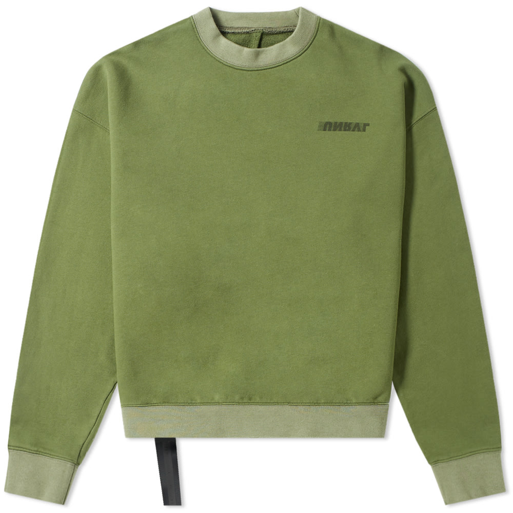 A brand in ‘motion’, Unravel Project define this sweat with their high-speed, reversed logo. The bold ‘UNRVL’ signature is stamped across the design in a multitude of styles; backing the olive construction with a graphic-heavy aesthetic. With the idea of volume being shown through drawstrings, Taverniti adds one to this sweat’s seam; delivering a slouchy look and feel that’s perfect for the laid-back LA streets.

100% Cotton
Loopback Jersey
Dropped Shoulders
Printed Branding
Woven Brand Patch
Elongated Drawstring
Engineered Branding
Ribbed Crewneck, Cuffs & Hem