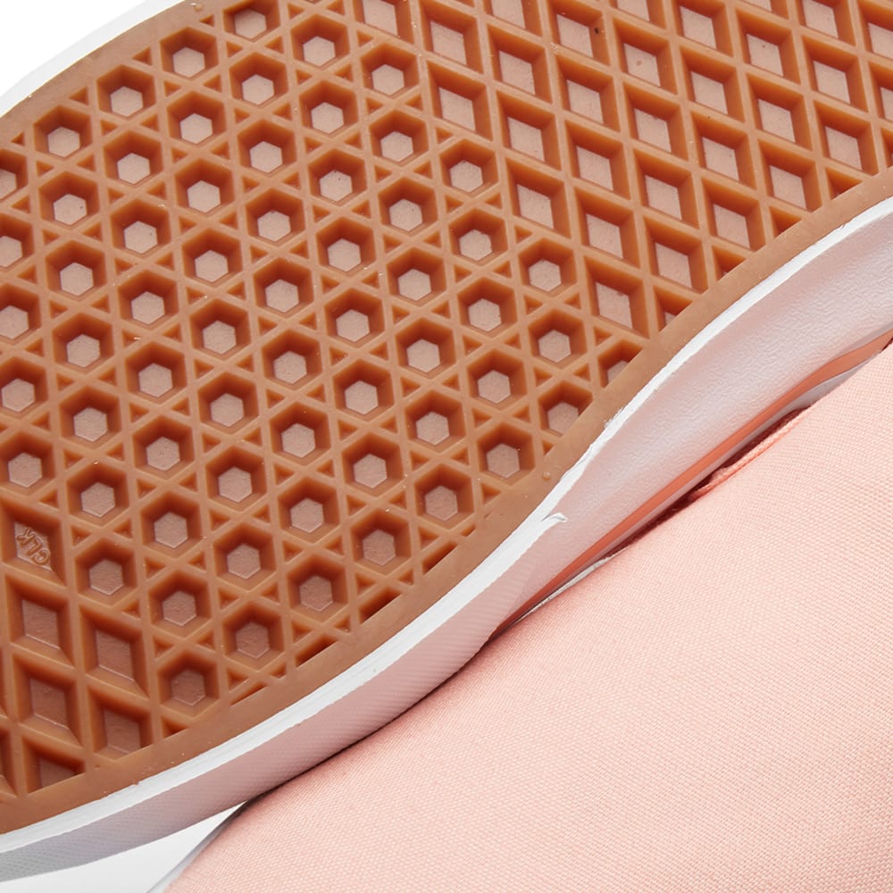 peach colored checkered vans