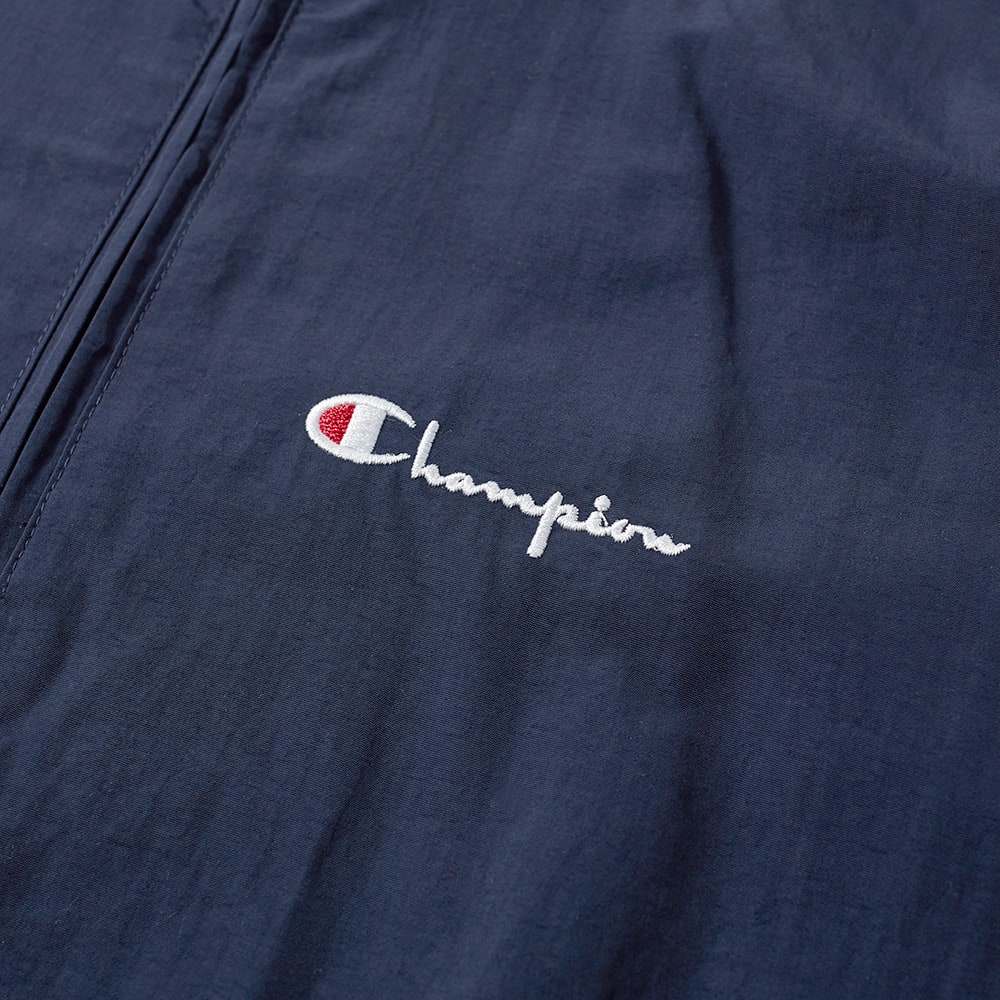 champion half zip track top
