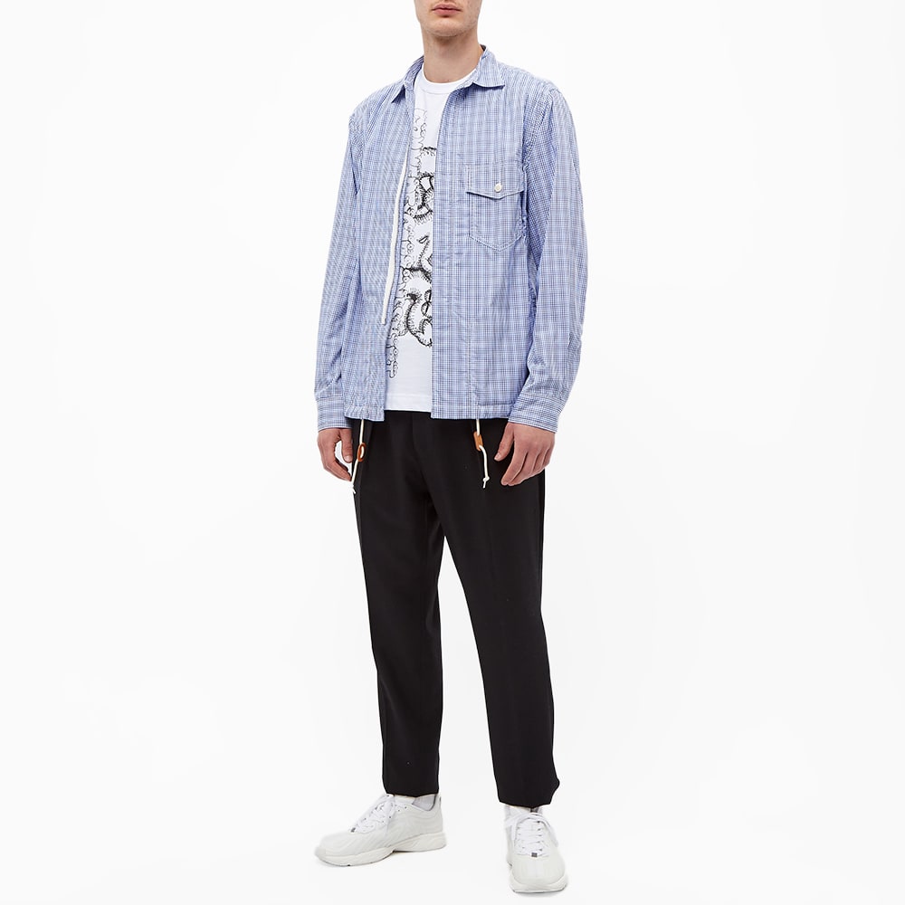 Comme des Garcons SHIRT x KAWS Print Tee Comme des Garcons SHIRT x KAWS Print Tee
