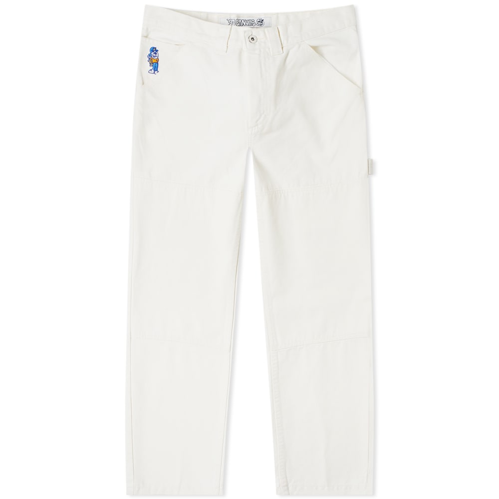 Combining ‘90s skate style with utilitarian flair, Swedish skatewear brand Polar Skate Co. deliver the ‘93 canvas pant in a clean-cut ivory. Boasting a semi-baggy fit to allow for plenty of generous space, this straight-legged pair are given a workwear touch with a hammer loop to the reverse, whilst the playful graffiti character mischievously sits to the pocket.  
 
100% Cotton 
Canvas Fabric 
Zip Fly   
Baggy Fit 
Straight Leg  
5 Pocket Set Up 
Embroidered Branding 
Woven Brand Patch
