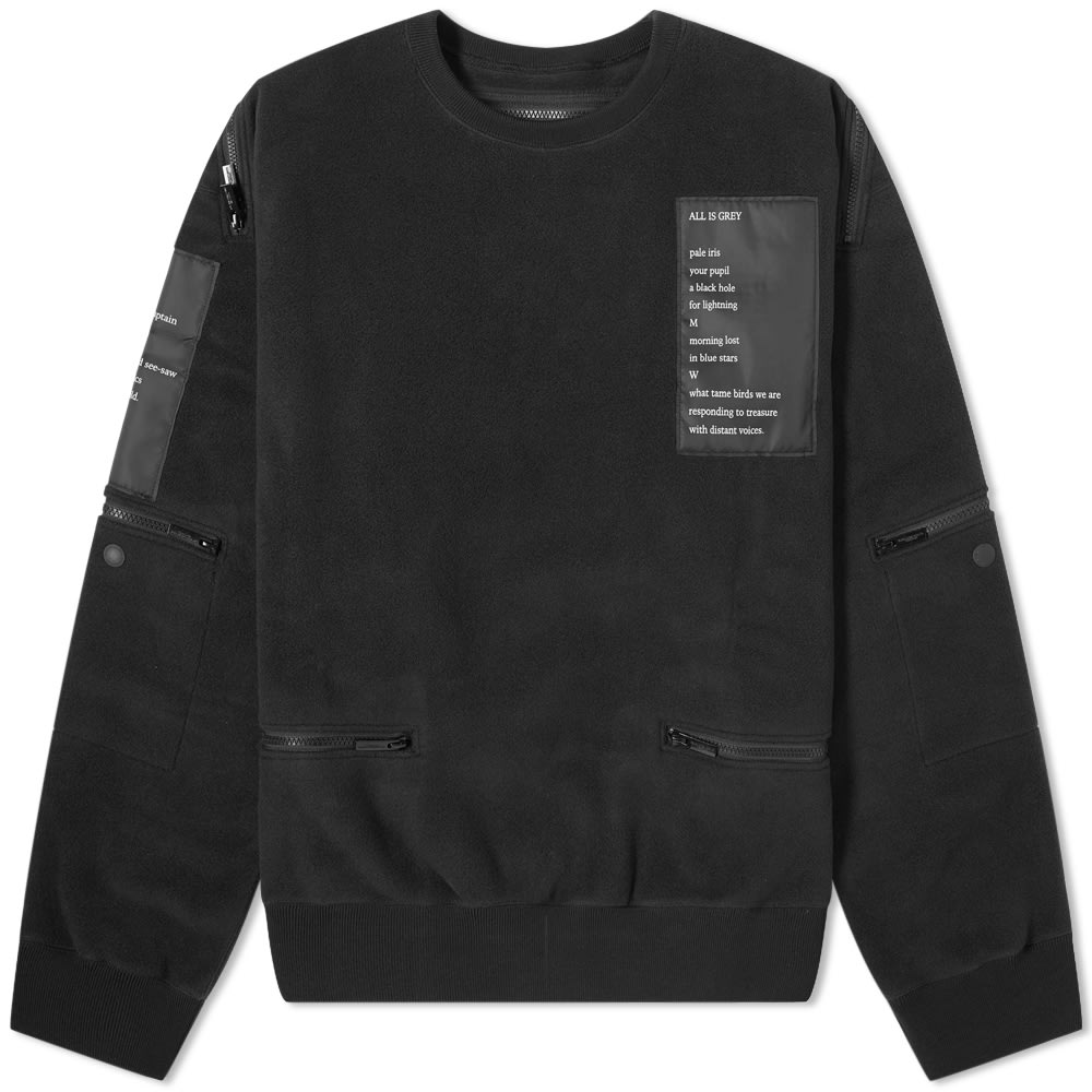 Peppered with poetry, this patched up pullover from TAKAHIROMIYASHITATheSoloist. has been made in Japan from cosy fleece fabric. Realised in all-black, it is detailed with punk-inspired zippers and is framed with snug fitting ribbed trims.

100% Polyester
Fleece Fabric
Zip Detailing
Ribbed Trims 
Made in Japan