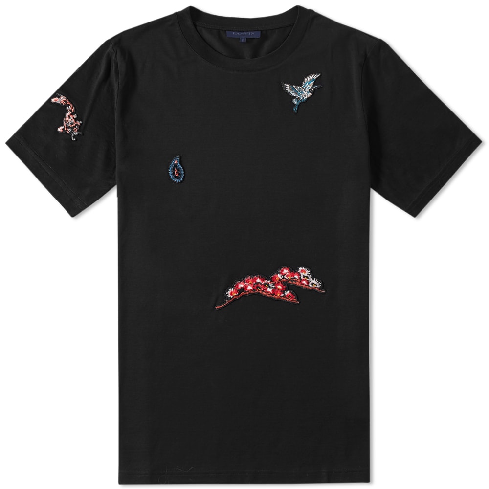 Tapping into their modern French luxury, Lanvin update this classic crew neck tee with embroidered applique patches throughout the body – a signature style seen throughout the house this season.

100% Cotton
Applique Patches
Made in Italy