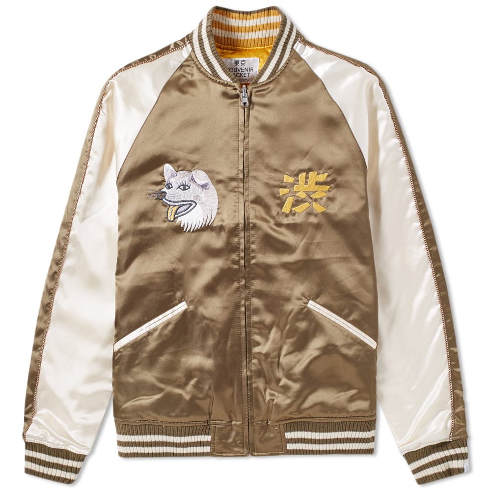 Originally created for American GIs to bring home after the post-war occupation of Japan, Vanquish deliver an intricately designed iteration of an SHIBUYA Souvenir Jacket. Boasting everything from the manic Shibuya crossing to the location of the Vanquish store in bold embroidered imagery to the back, this exceptionally well put together outerwear piece utilises classic athletic features such as striped ribbed collar, cuffs and hem, raglan sleeves and varsity-like styling.

100% Polyester
Bold Embroidery Throughout
Two Angled Front Pockets
Striped Trim
Ribbed Collar, Cuffs & Hem
Full Zip Fastening
Raglan Sleeves