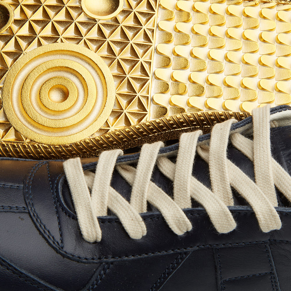 maison margiela gold sneakers
