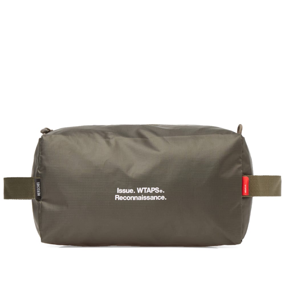 WTAPS and Herschel Supply Co. have combined their distinctive style to produce a range of military basics for the modern man. A wash bag to keep all your grooming essentials safely stored in one place, the lightweight 70D ripstop and army-inspired hues round off the military influences. The main compartment zips open to reveal ample storage space for hair products, aftershave, skincare and whatever else the today’s trooper needs to combat everyday duties.

70D Ripstop Nylon Shell
Zip Closure
Printed Dual Branding