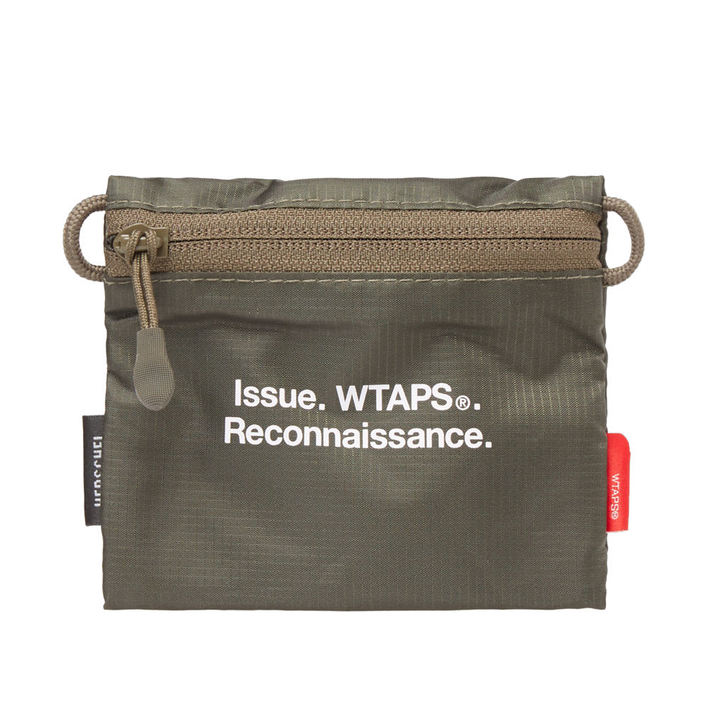 A collaboration to help the modern man combat daily life, WTAPS and the Herschel Supply Co. have designed a five-piece range of military-inspired basics. Among the highlights, the zip pouch will help battle a considerable amount of loose change from subsiding in your pockets. Marked with dual branding, the lightweight 70D ripstop fabric and military hues round off the capsule collections vibes.

70D Ripstop Nylon Shell
Zip Closure
Printed Dual Branding