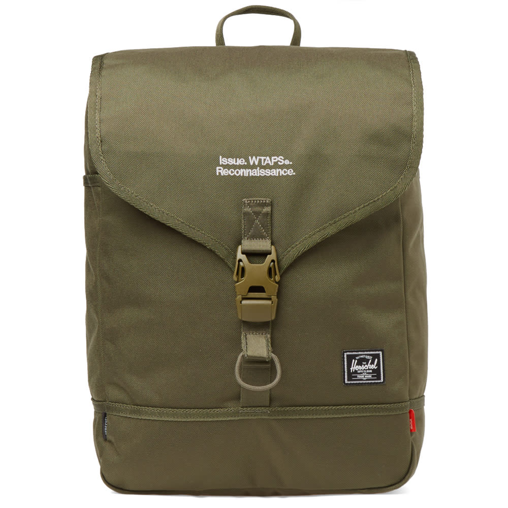 Herschel Supply Co. and WTAPS join forces for a five-piece range of bags and accessories; combining a distinctive military aesthetic with strong streetwear sensibilities. A capsule collection rooted in daily life, this Daypack has been built with everyday use in mind. Crafted from a sturdy and protective abrasion-resistant 1000D Cordura, keep all your personal items safely stored via the various storage options, including a neoprene padded 15" laptop sleeve.

1000D Cordura Nylon Shell
Clip-Fastened Main Compartment
Padded 15” Laptop Sleeve
Interior Pockets
Padded Shoulder Straps
Printed Dual Branding