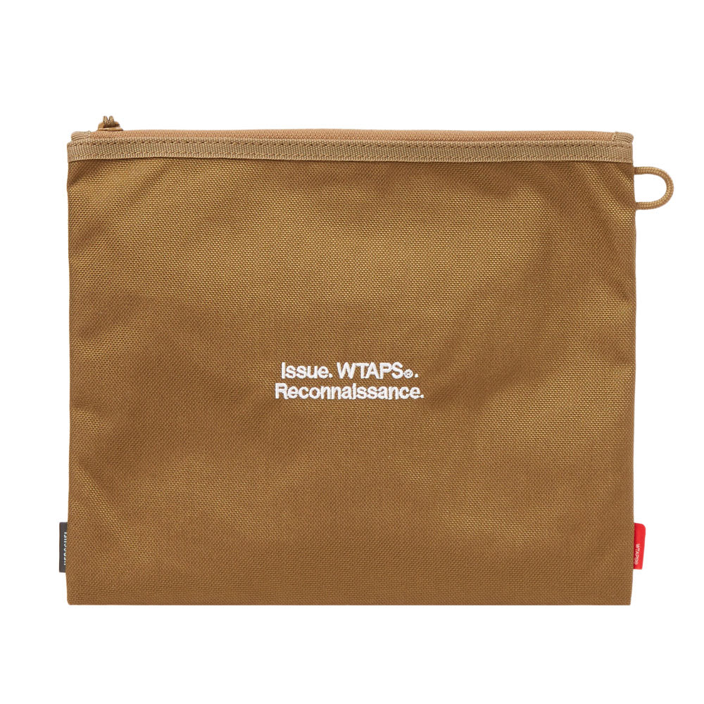 Having built a reputation on translating the military aesthetic to daily wear, Tetsu Nishiyama-headed label WTAPS joins forces with Vancouver’s Herschel Supply Co. on a capsule collection of bags and accessories. This web case combines a distinctive military aesthetic with strong streetwear sensibilities, fusing abrasion-resistant 1000D Cordura with dual branding. Ideal for keeping smaller items easily accessible in larger luggage, the option to be used as a clutch will make a statement with any outfit.

1000D Cordura Nylon Shell
Zip Closure
Clear Pouch to Front
Printed Dual Branding