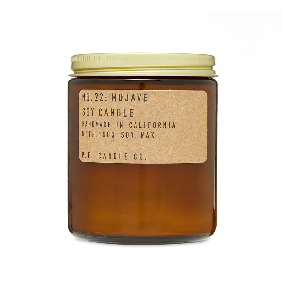 Capturing the essence of desert exploration, this No.22 Mojave candle from P.F. Candle Co. consists of scented soy wax that has been hand poured into an amber-tone glass vessel. Made in L.A., the nostalgic scent boasts notes of white musk, cedar, and creosote bush; while golden poppy, white lavender and desert sage lend an earthy finish.

7.2oz 
Soy Wax
Top Notes: Creosote, Dry Desert Air, Chaparral, Desert Sage
Mid Notes: Golden Poppy, Rose, White Lavender
Base Notes: Cedarwood, White Musk, Sandalwood, Vetiver
40 – 50 Hours Burn Time 
Made in the USA