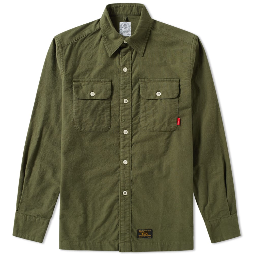 A stalwart of Japanese streetwear, Tetsu Nishiyama’s WTAPS never strays far from its roots, cultivating collections inspired by combat and workwear silhouettes with an impermeable streetwear edge. Consistent in their varied approach to high-quality apparel, this iteration of their Union 03 Shirt draws on classic workwear design, delivering a durable twill fabric, with two flap-closure pockets featuring prominently to the chest, ensuring a utilitarian aesthetic in this everyday piece of shirting.

100% Cotton
Twill Fabric
Two Flap-Closure Chest Pockets
Woven Branded Tabs
Made in Japan