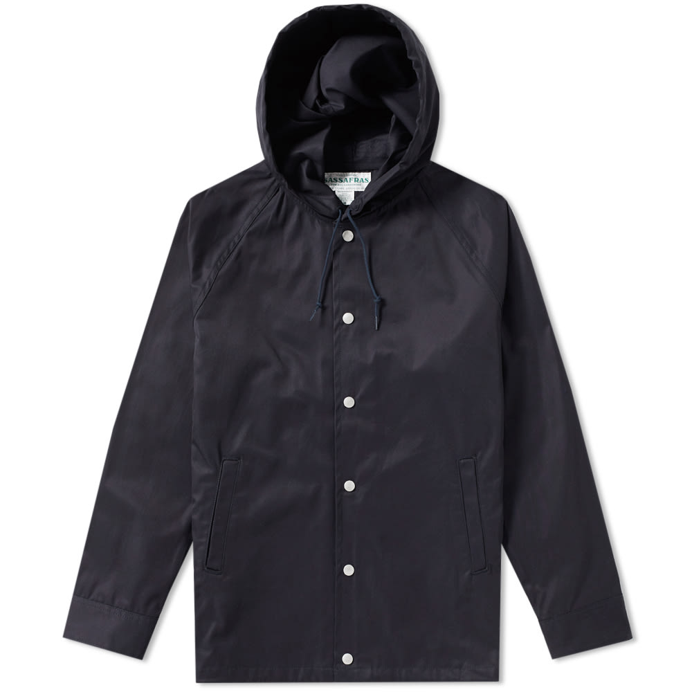 A new concept that goes beyond garden attire, Sassafras takes unique elements of workwear and creates functional, comfortable and heavy duty clothing. A niche Japanese label that started out in 2004, has now established itself in rich clothing intended for garden use – although it works just as well as part of a stylish, durable wardrobe. 
The Gardener Bud Breaker Jacket takes the silhouette of a traditional coach jacket and crafts it in the Sassafras aesthetic. Cut from a lightweight cotton gabardine and equipped with a drawstring hood, press stud fastening and multiple pockets, this utilitarian jacket has been expertly crafted in Japan.

100% Cotton Gabardine
Raglan Sleeves 
Branded Press Stud Fastenings 
Drawstring Adjustable Hood & Waistband
Multiple Pockets Throughout
Stitched Elbow Patches
Made in Japan