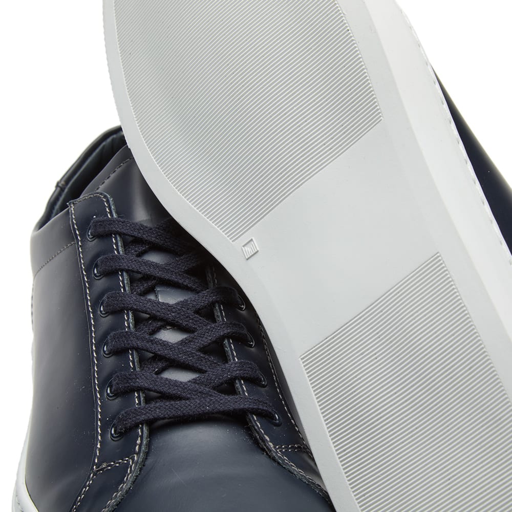 Woman by Common Projects Retro Low Boxed Leather Navy | END.