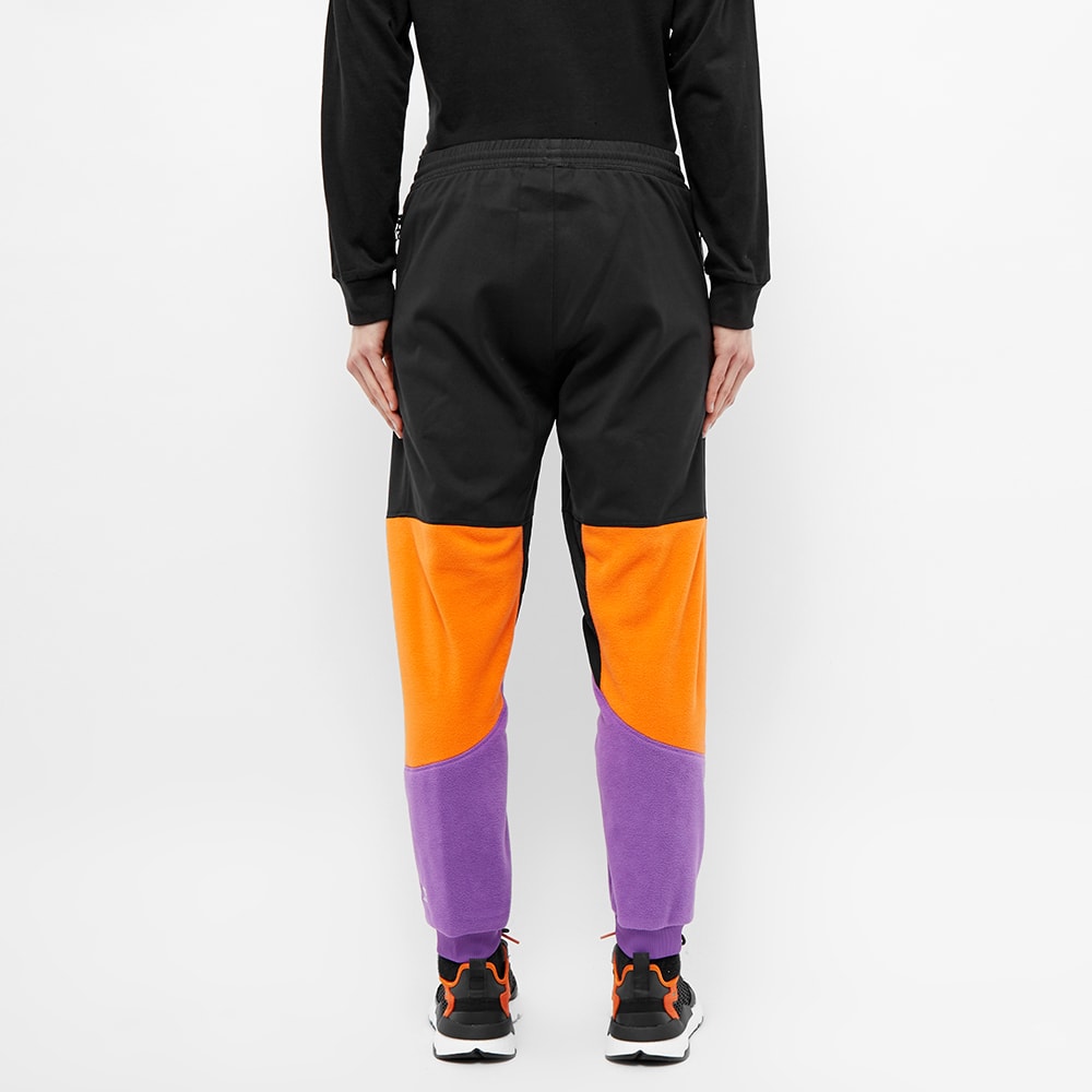 black and purple adidas pants