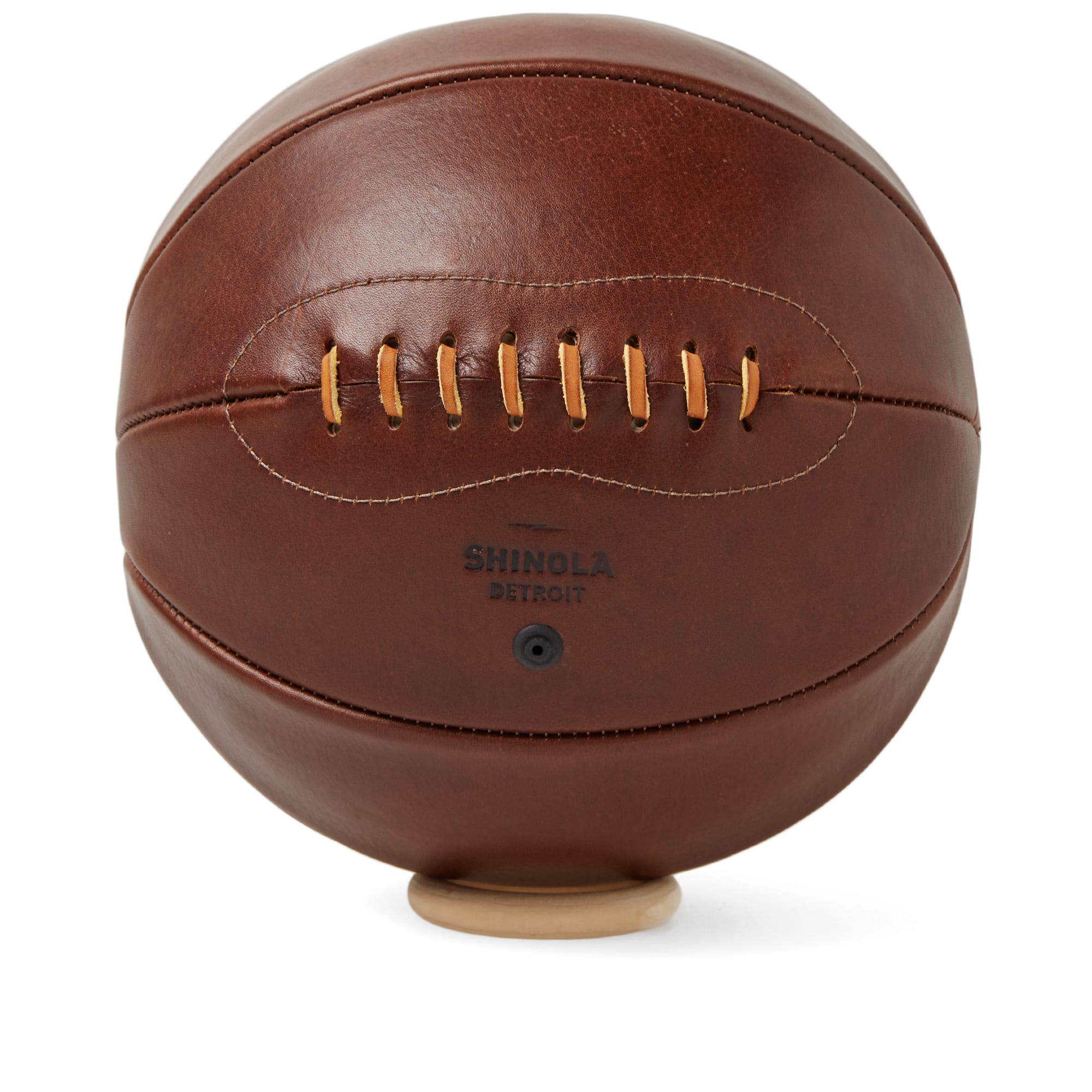 Hailed as a true American success story, Shinola has re-established forgotten crafts and skills in the USA – all locally operated in Detroit factories. The label was founded in 2011 and has since grown its reputation worldwide.
A true icon of American sporting history and with a traditional lace-up design, the Shinola Leather Basketball has been created by hand in New Jersey, USA.

Premium Leather
Lace Up Design
Debossed Logo
Hand Stitched
Supplied With Wooden Display Ring
Made In The USA