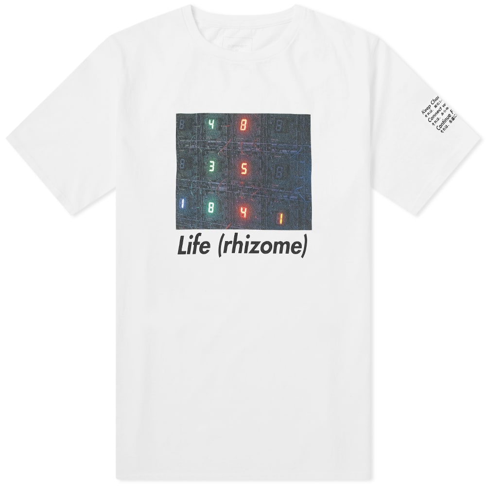 Programmed with LED lights, Miyajima Tatsuo’s ‘Life (rhizome)’ microcomputer art installation brings a digital charge to SOPHNET.’s 20th anniversary capsule. Pairing up with the Japanese creative, the streetwear imprint offer this bright white tee with a print of Tatsuo’s work; underlined with its moniker, while the artist’s three concepts are scripted across the sleeve.

100% Cotton
Ribbed Crewneck
‘Life (Rhizome)’ Print
‘Miyajima Tatsuo’ Back Print
Made in Japan