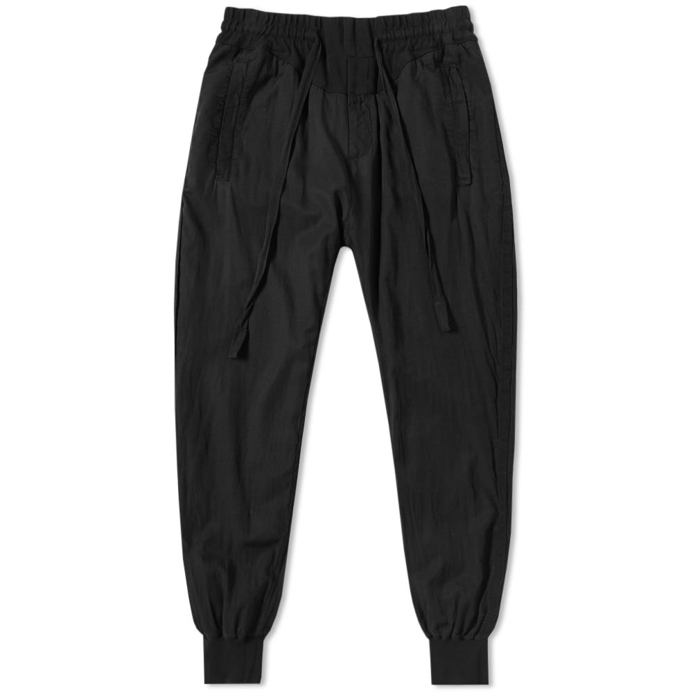 Haider Ackermann’s subtle references to London’s Punk movement permeate his SS17 collection, his refined Parisian eye ensuring the grunge detailing that features throughout is elevated to that of irreverent luxury.Applying his own trademark handwriting to a piece of sporting apparel, Ackermann's jogging pant have been constructed from a cotton-blend jersey and feature a slim-cut to the leg, finishing in a deep ribbed cuff. To the front of the pant sit two pockets along with a subtle grosgrain trim to the outside leg.

Cotton & Rayon Blend
Washed Twill
Elasticated Drawstring Waist
Pockets To Either Side
Grosgrain Trim
Ribbed Ankle Cuffs