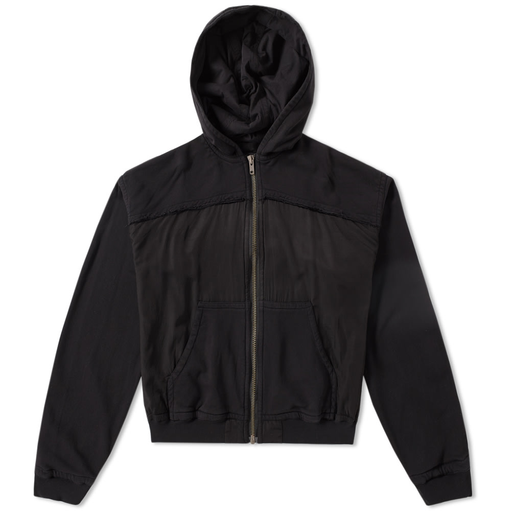Haider Ackermann’s subtle references to London’s Punk movement permeate his SS17 collection, his refined Parisian eye ensuring the grunge detailing that features throughout is elevated to that of irreverent luxury.Further proving the hoody's relevance extends far past the world of sportswear, Ackermann's rendition of the silhouette is updated with a series of artfully distressed details that give the piece a soft, grunge-inspired edge.

100% Cotton
Garment Dyed
Contrasting Zip Closure
Split Kangaroo Pocket
Raw Edged Seams
Cropped Silhouette
Dropped Shoulderline
Ribbed Cuffs & Hem