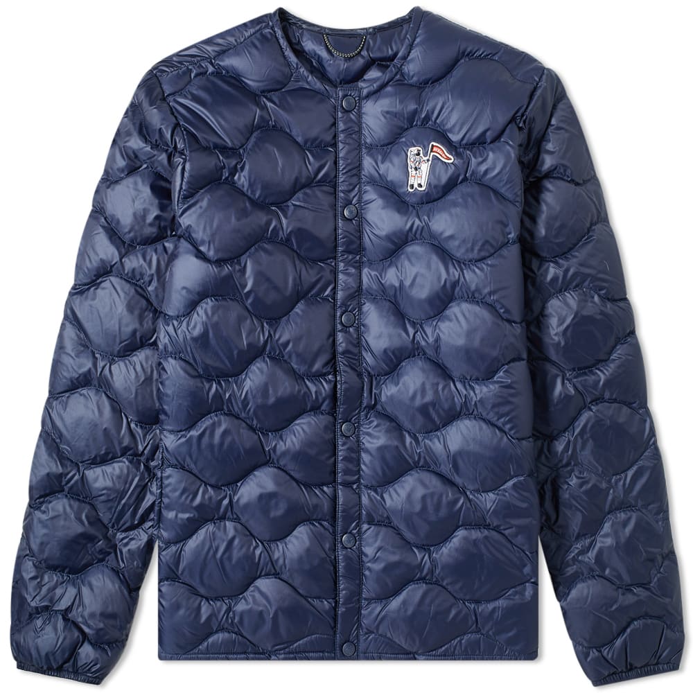 A must-have for your cold weather staples, this quilted liner arrives from Billionaire Boys Club in a rich navy hue. Whether worn as a mid-layer or as a top layer, its interior boasts an insulating down fill that is designed to lock in the warmth. Finished with the synonymous astronaut motif to the chest, add instant street-style appeal to your winter attire.

100% Polyester
Ripstop Fabric
Down Fill
Press Stud Closure
2 Interior Pockets
2 Side Pockets
Appliqué Branding