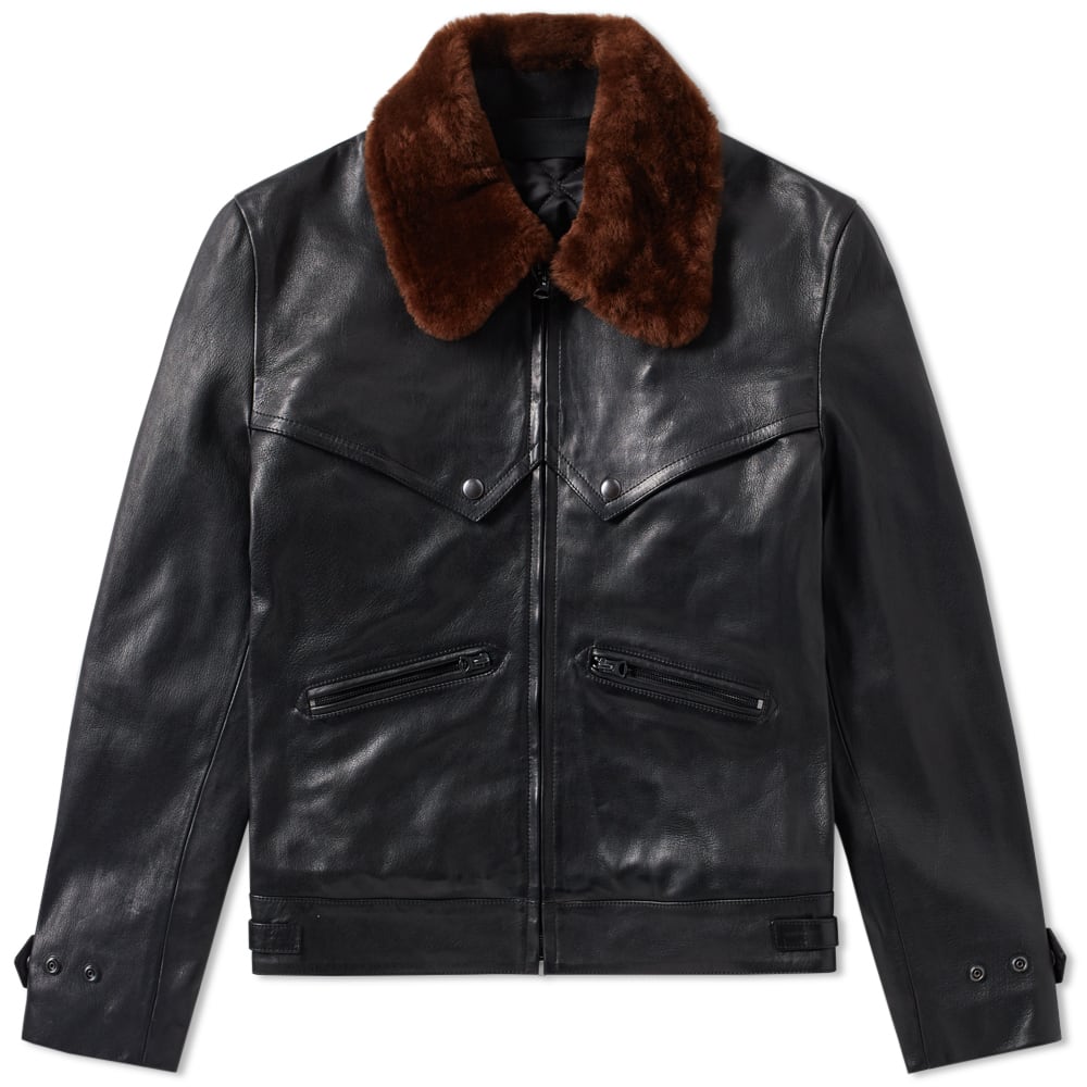 A true trophy jacket, the Arthur by Acne Studios features a shell from the finest leather, with a merino lamb shearling collar to provide an additional layer of warmth. The jacket's design references traditional Western-style shirts with a pointed front yoke concealing two chest pockets. Styled with a zip closure and adjustable D-Rings to either side, the jacket is completed with a lightly padded lining.

Leather Construction
Merino Shearling Collar
Zip Closure
Western Yoke Detail
Adjustable Side Tabs
Quilted Lining