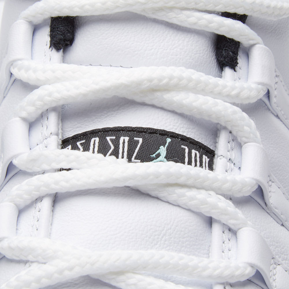 air jordan 11 retro low white black emerald rise