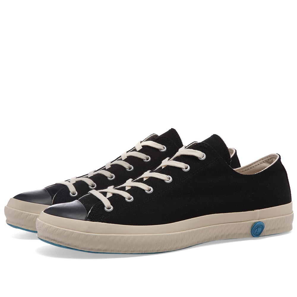 Once again this season, Shoes Like Pottery utilises a unique vulcanising process when crafting its canvas sneakers. Carried out by a handful of skilled manufacturers and named 'ka-ryu' in Japanese, this process involves each pair of shoes being kiln-fired, giving their rubber soles a uniquely flexible and highly durable finish.

Canvas Uppers
Rubber Toe Cap
Rubberised Brand Stamp 
Vulcanised Rubber Outsole 
Made in Japan