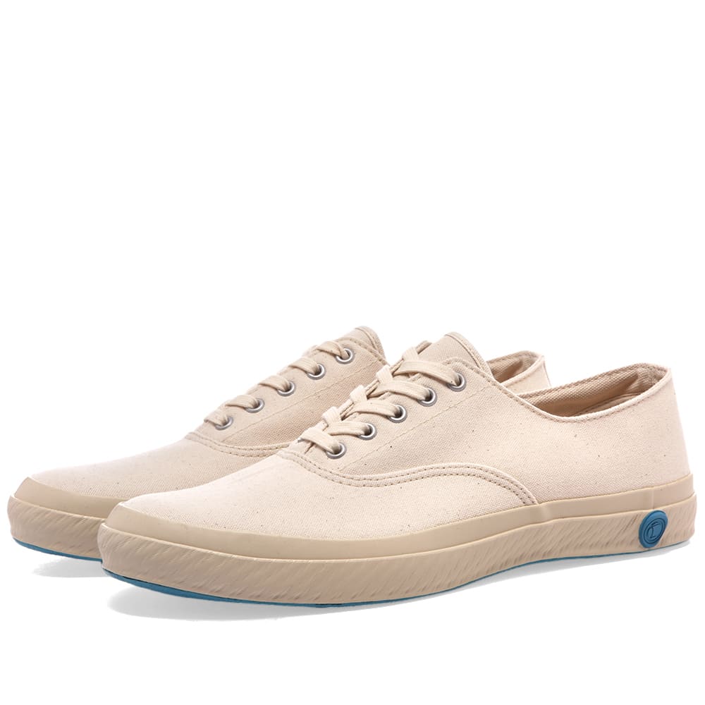 By kiln-firing each pair of sneakers, Japanese brand Shoes Like Pottery makes some of the finest canvas sneakers available today. Built with rubber soles that have a uniquely flexible and highly durable finish, this canvas pair of 03JP’s have been hand stitched in Japan and are finished off with a wax stamp style sole decal – a mark of quality and distinction. 
 
Canvas Uppers 
Rubberised Brand Stamp 
Vulcanised Rubber Outsole 
Made in Japan