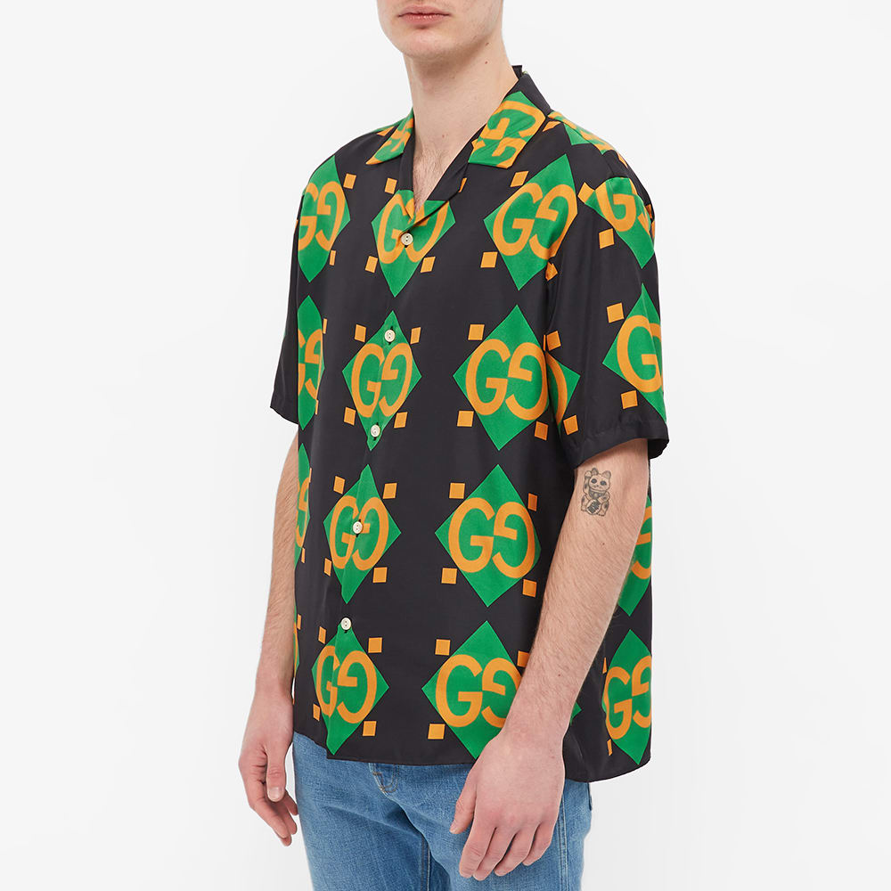 orange and black gucci shirt