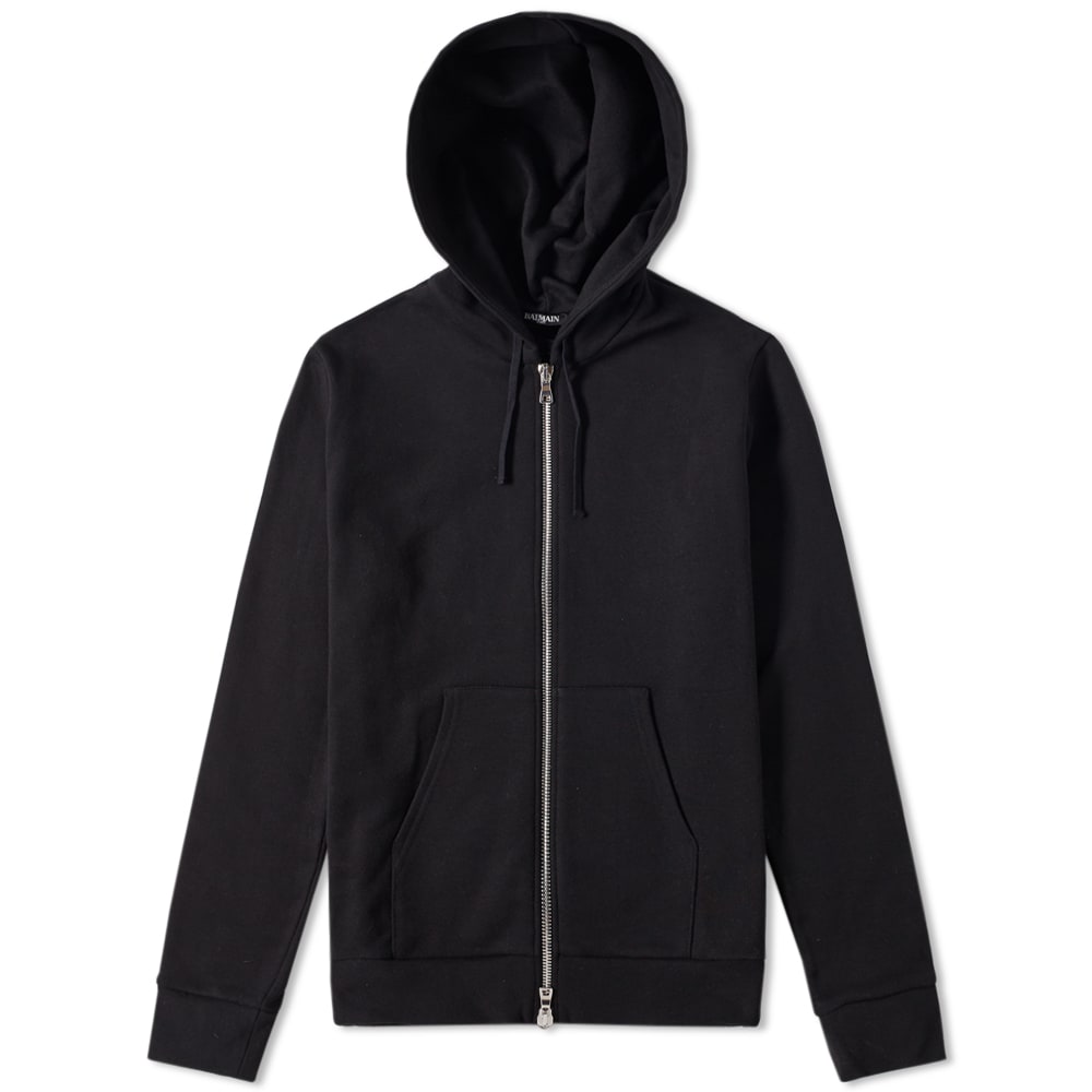 What began in 1945 as a couture house in Paris has today evolved into one of the most sought-after labels in the world. Today Balmain balance the traditional techniques of their past with the strikingly bold aesthetic designer Olivier Rousteing has become known for.Balmain's take on the classic hooded sweat is, understandably, a luxurious one. The sweat is styled with zips to the sides, split kangaroo pocket to the front and a two-way zipper.

100% Cotton
Double Ended Zipper
Side Zips
Split Kangaroo Pocket
Drawstring Hood
Made In Italy