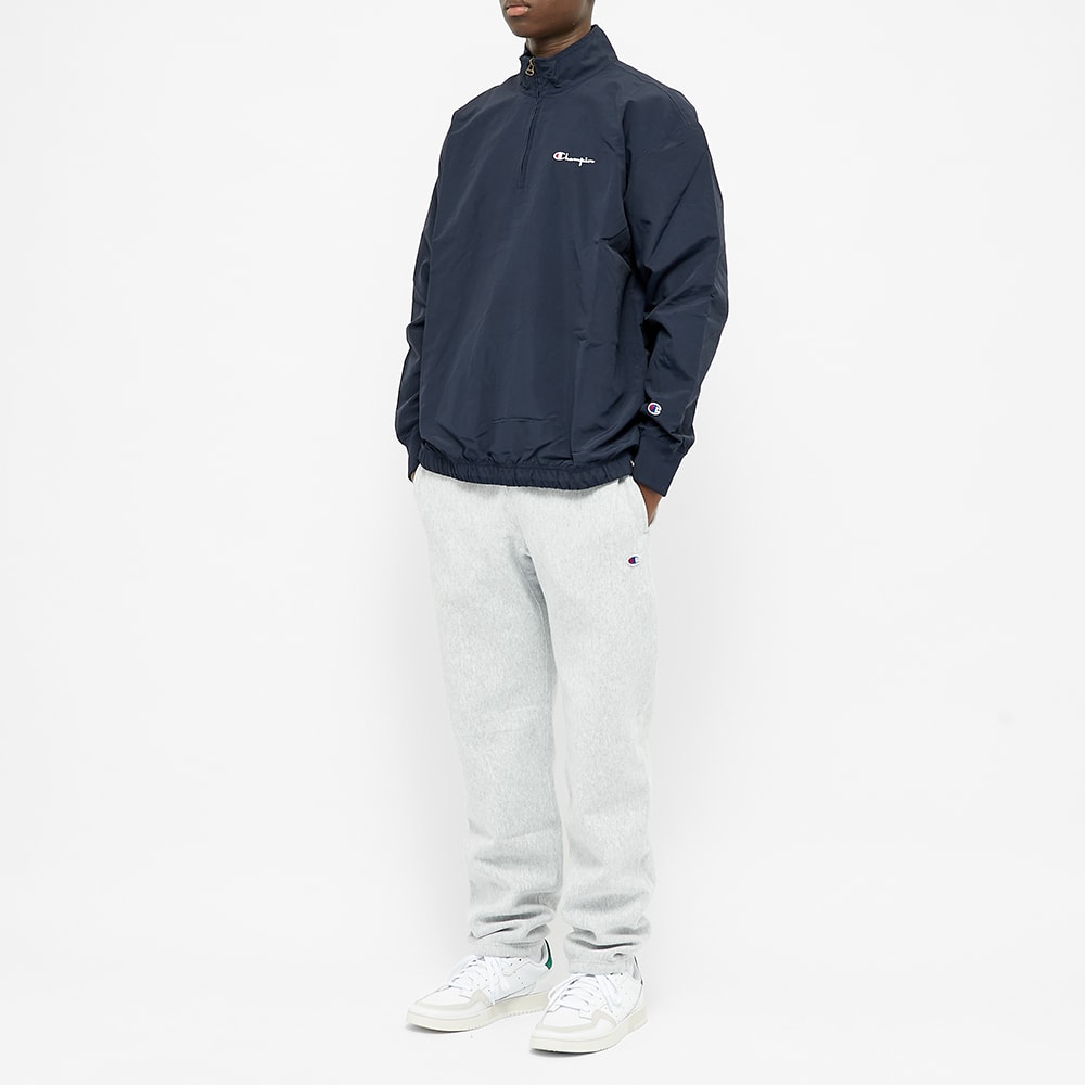 champion half zip track top