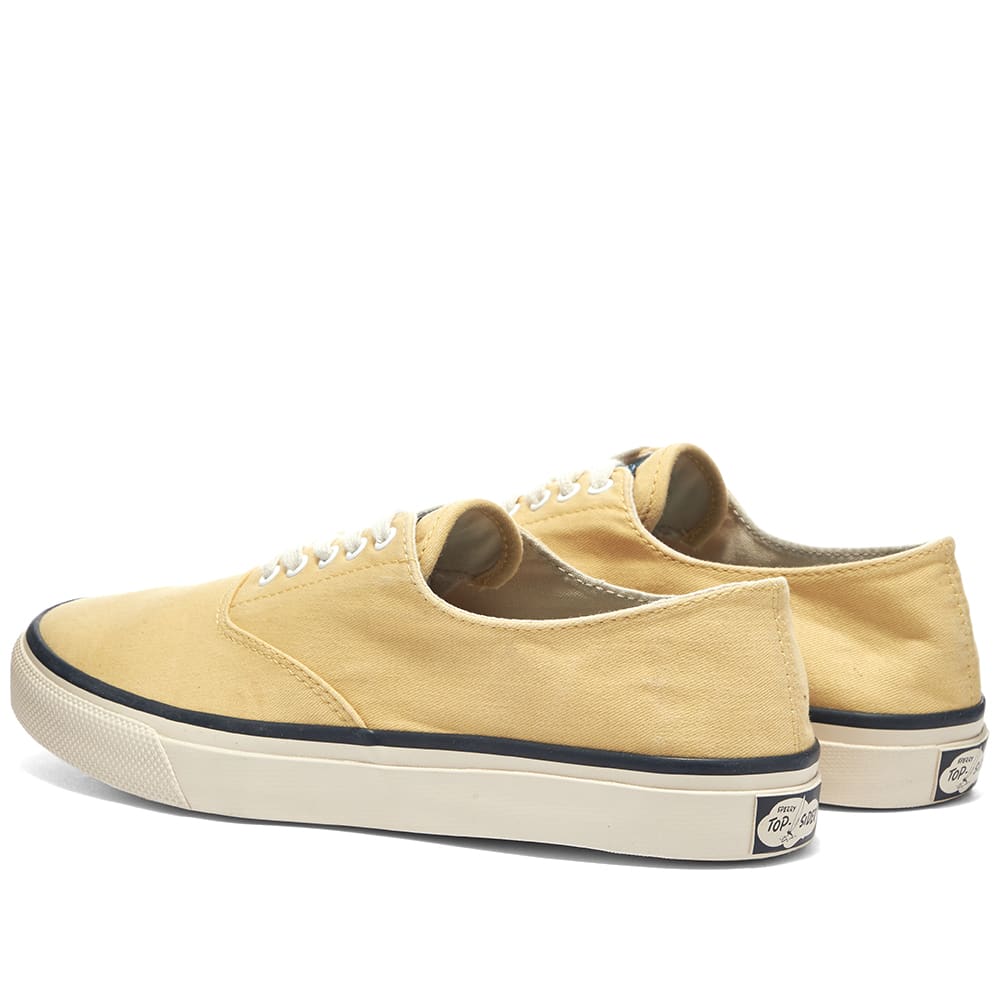 yellow sperry sneakers