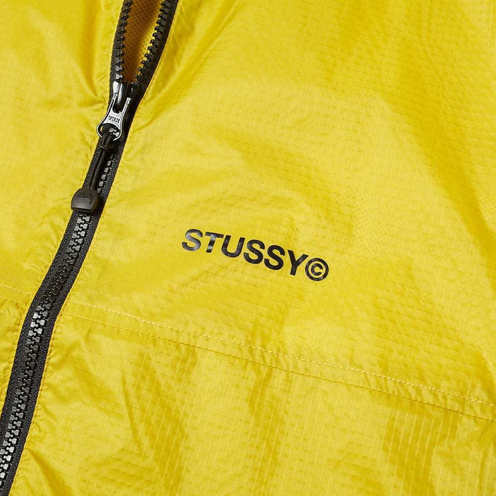stussy yellow jacket