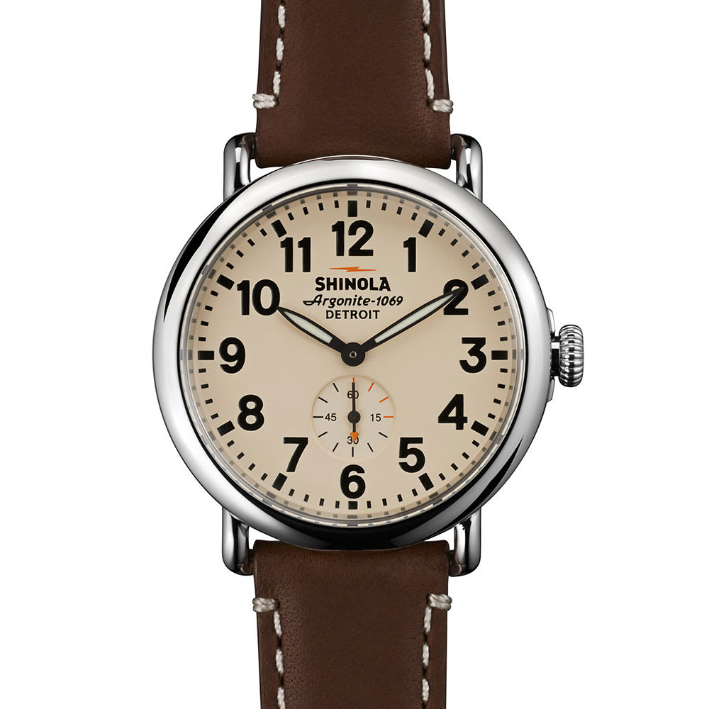 Hailed as a true American success story, each and every piece of Shinola’s vast product offering is crafted with extreme care and consideration in the label’s Detroit factories, where they have been commended for restabilising the city’s history as the capital of industry within the USA.
With an aim of producing a series of timepieces to rival the world-renowned Swiss manufacturers, Shinola’s watch offering expands to include new editions of the classic Runwell model. Styled with a stainless steel case and black Hadley-Roma leather strap.
Testament to Shinola's belief in fine craftsmanship, each watch is presented in a wooden display box, completed with a tin of leather care balm and a card displaying which member of the Shinola team crafted the timepiece.

41mm Stainless Steel Case
Super-LumiNova Hands, Arabic Numerals & Hour Markers
Argonite 1069.2 Quartz Movement
Hadley-Roma Leather Strap
5 ATM Depth Resistance