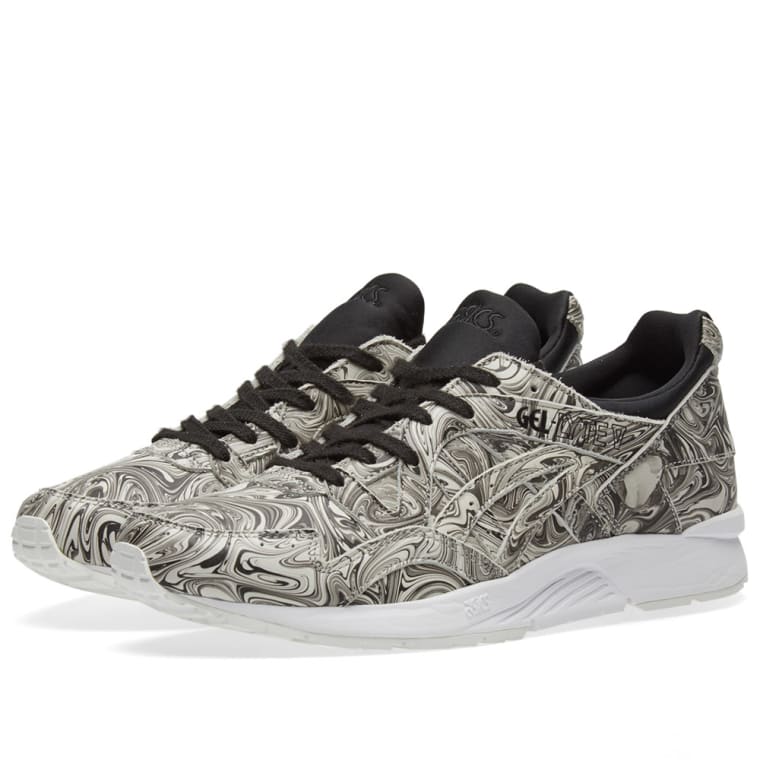 white asics with black paint white asics with black paint