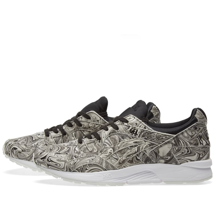 white asics with black paint white asics with black paint