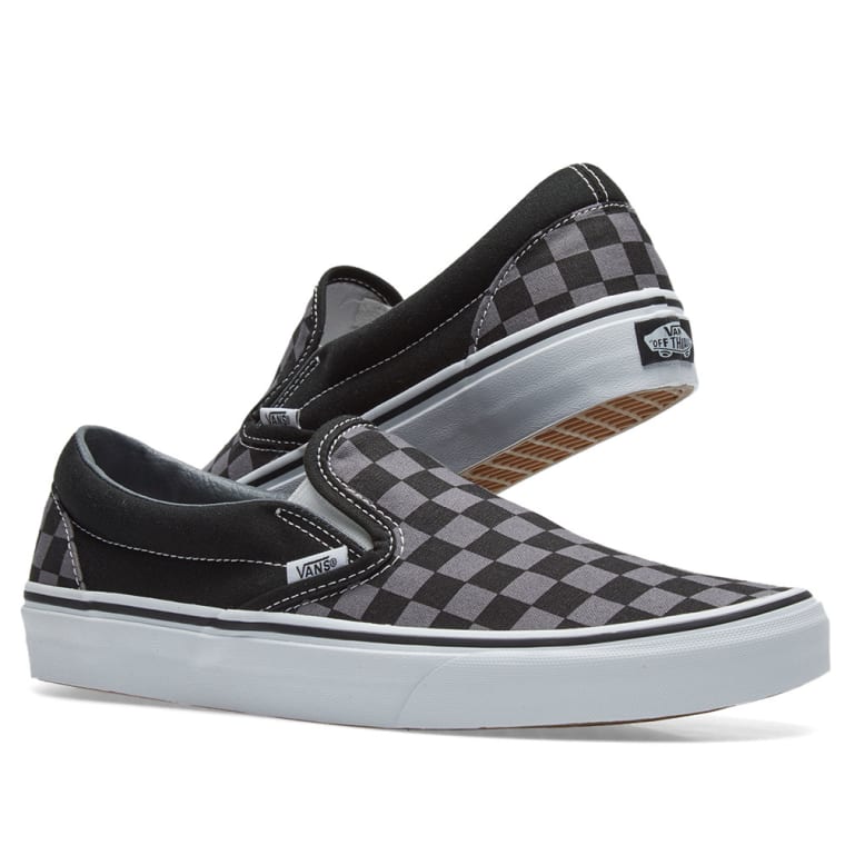 all black slip on vans womens