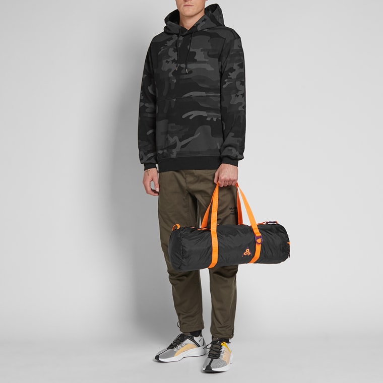 Nike ACG NSW Packable Duffle Bag (Black & Bright Mandarin) END.