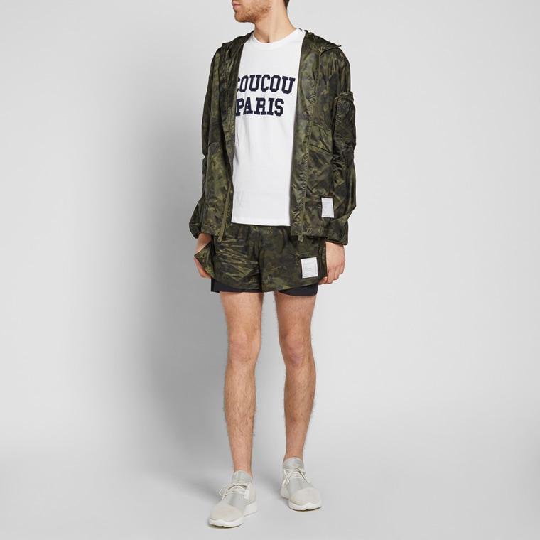 Satisfy Packable Wind Breaker (Reflective Camo) END.