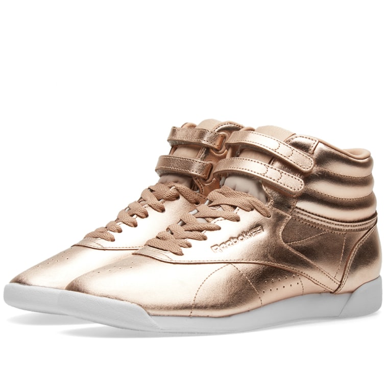 gold reebok freestyle