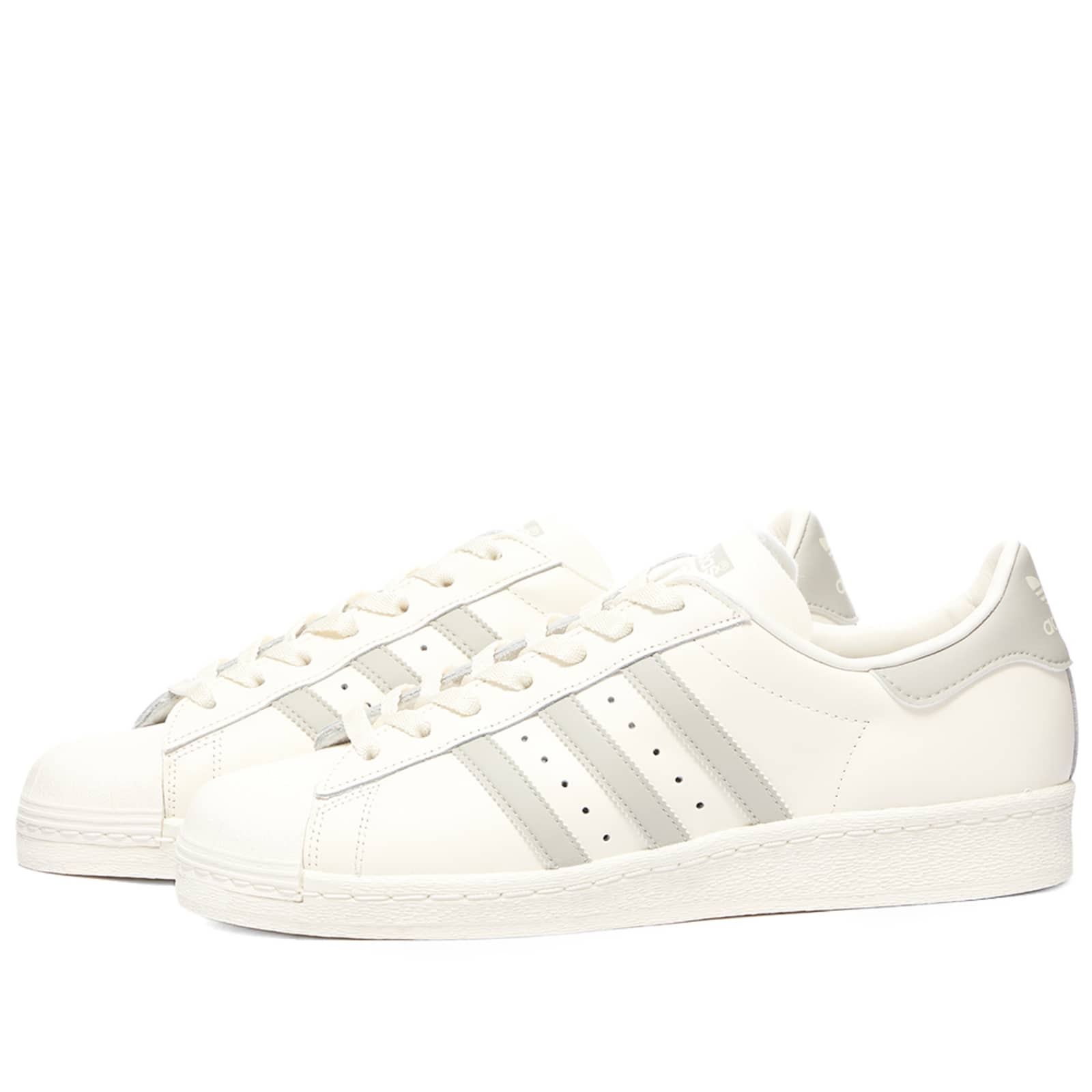 grey and white superstars