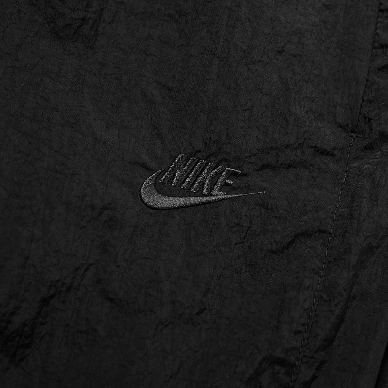 nsw swoosh woven pant in black