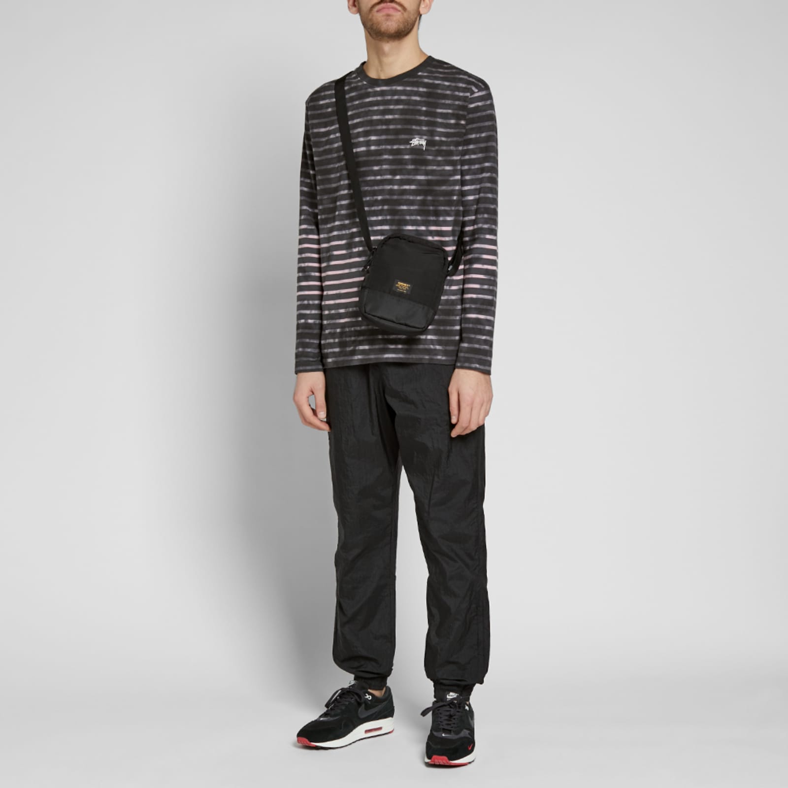 nsw swoosh woven pant in black