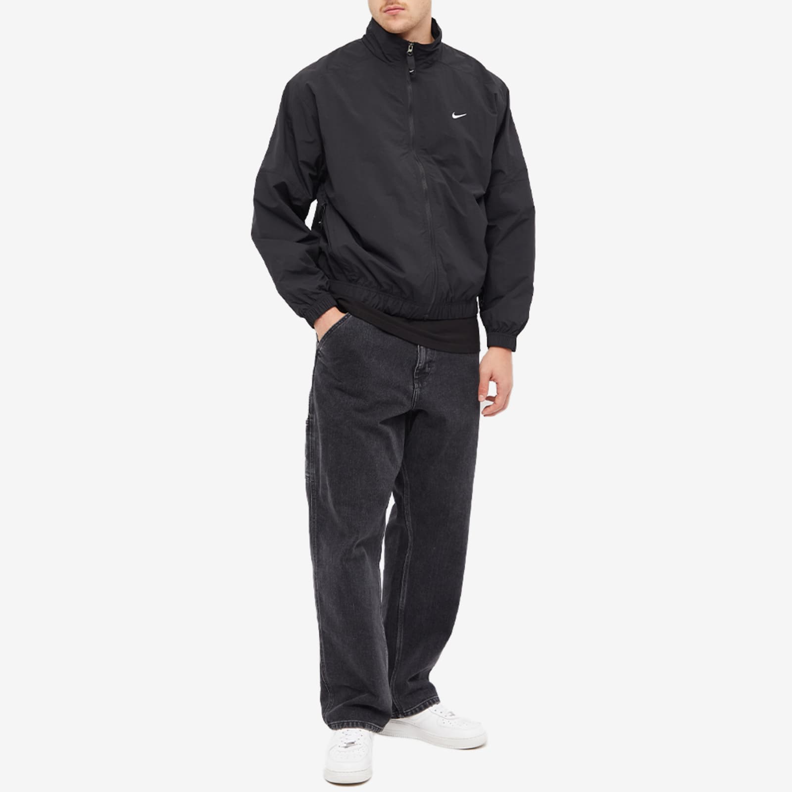 nike woven track jacket in black