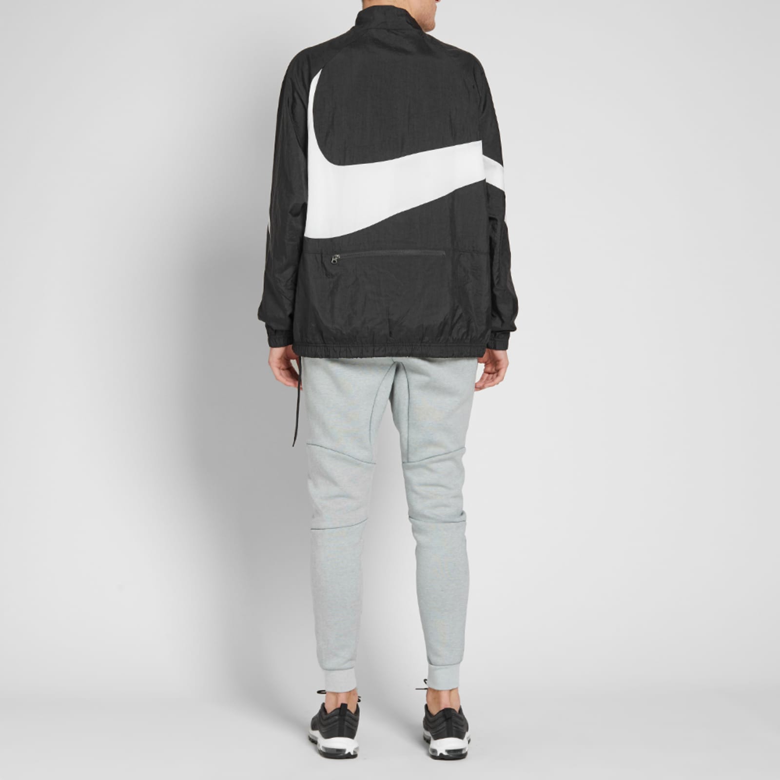swoosh half zip