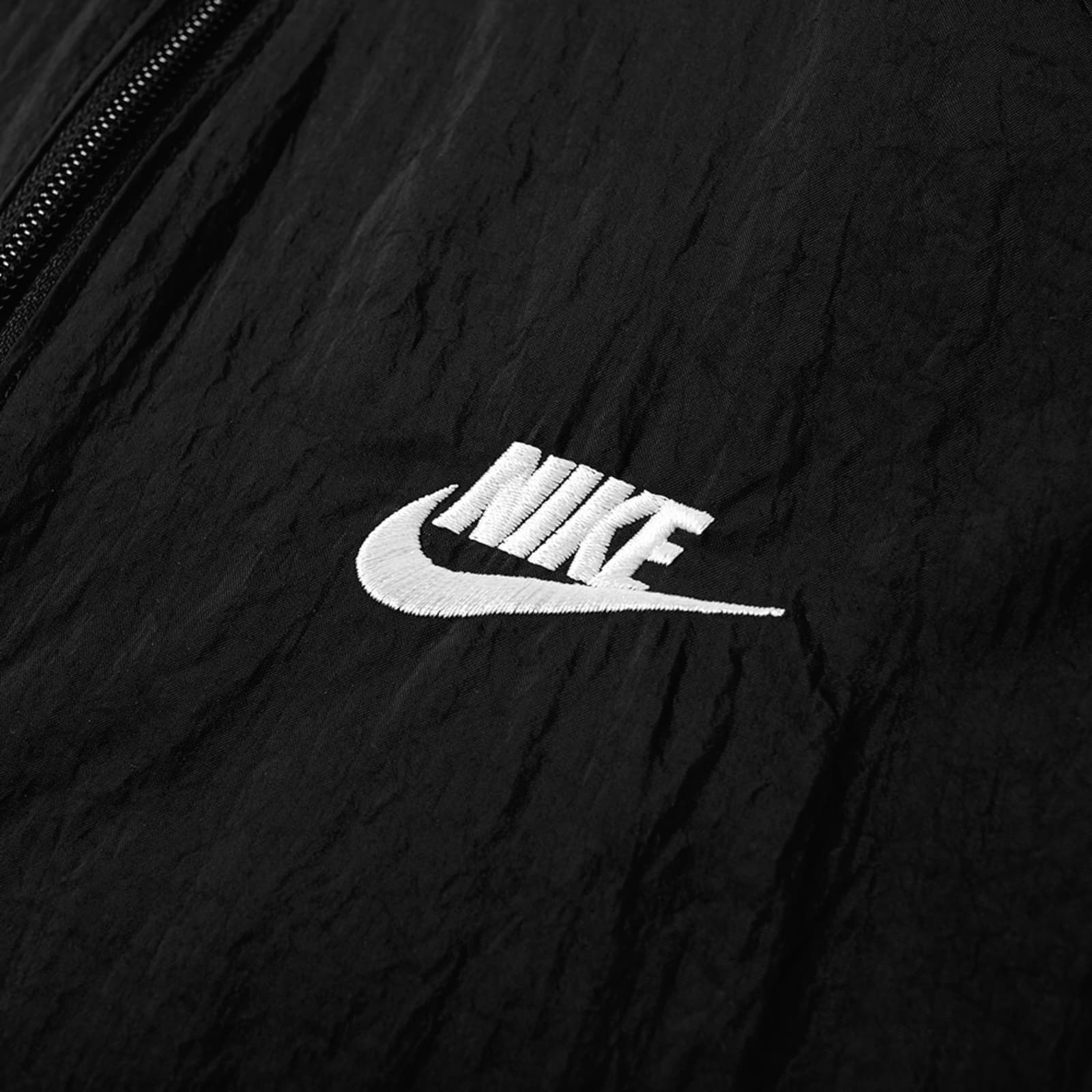 swoosh half zip