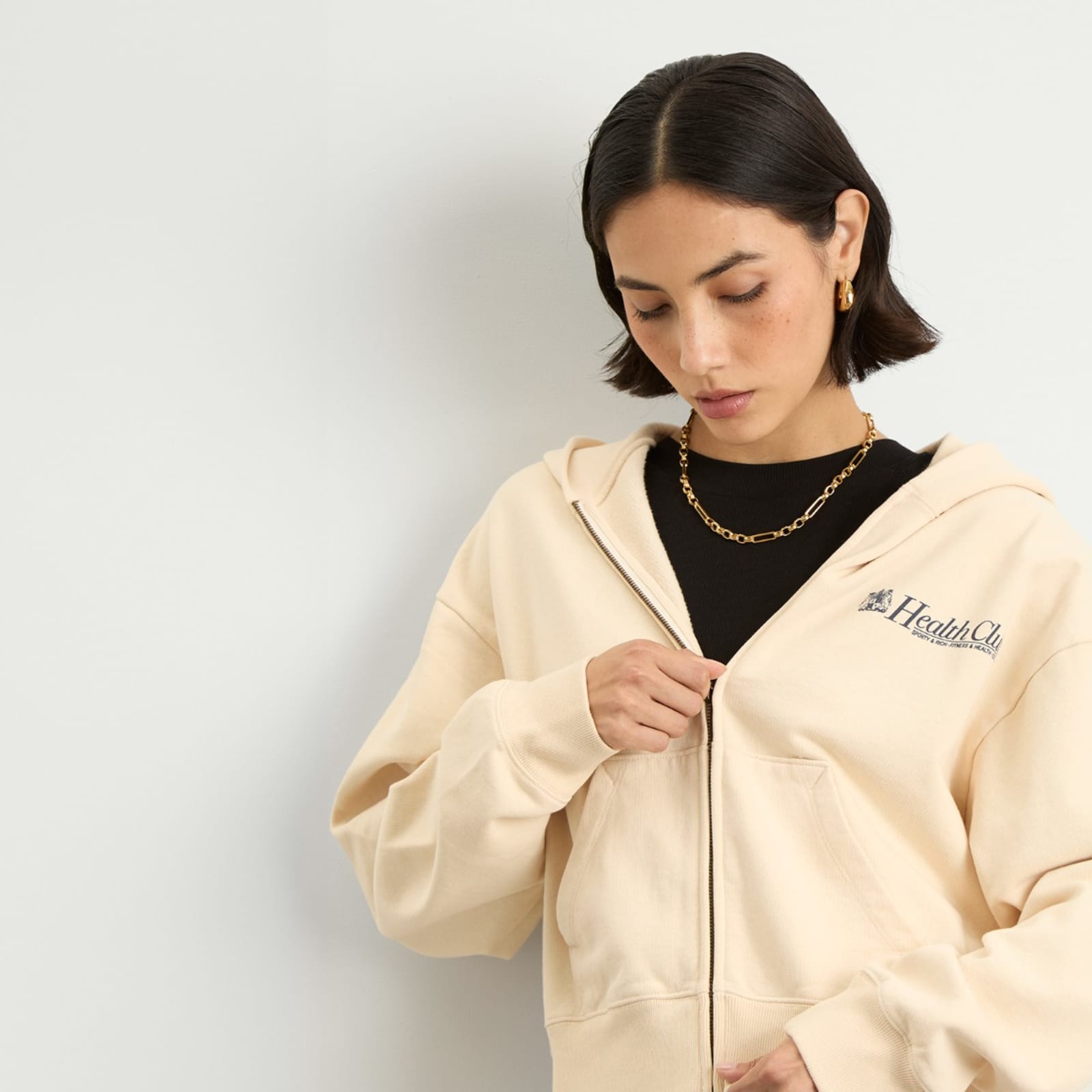 Sporty & Rich Lion Health Cropped Zip Hoodie