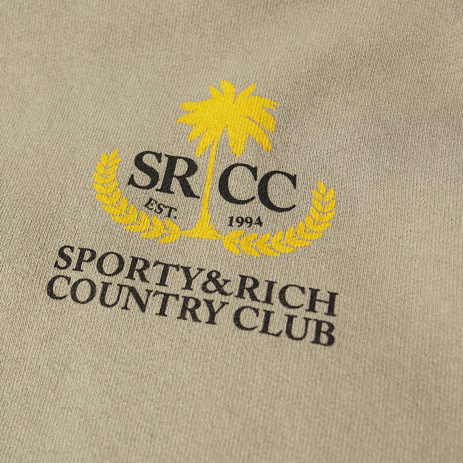 Sporty & Rich Country Club Hoodie Elephant, Black & Gold END.